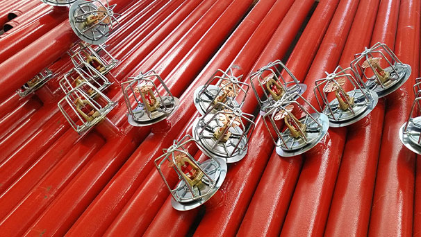 A row of sprinkler pipes